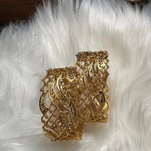 Elegant Gold tone Leaf Patterned Cuff Bracelet.   B